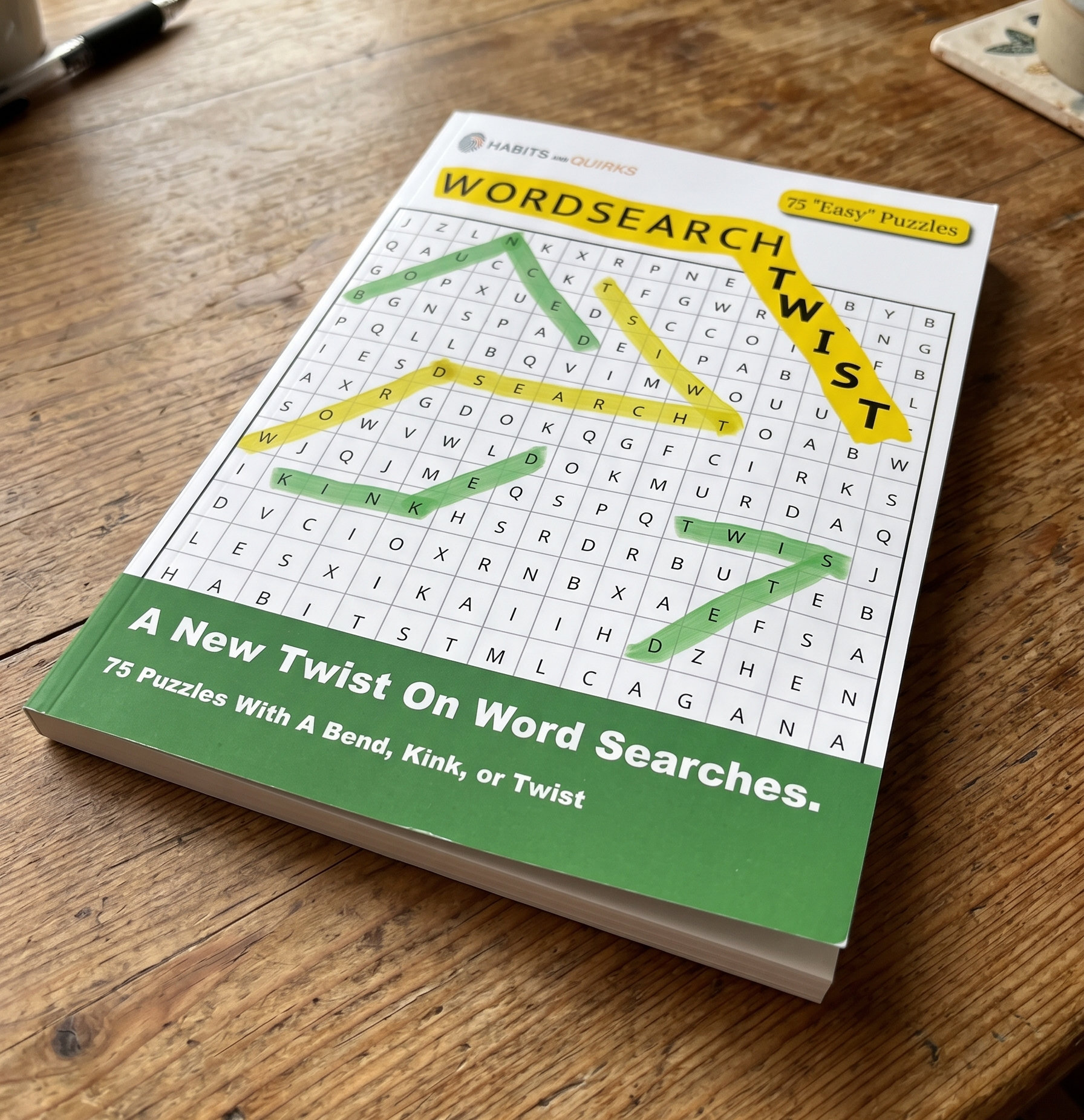 WordsearchTwist book on a desk
